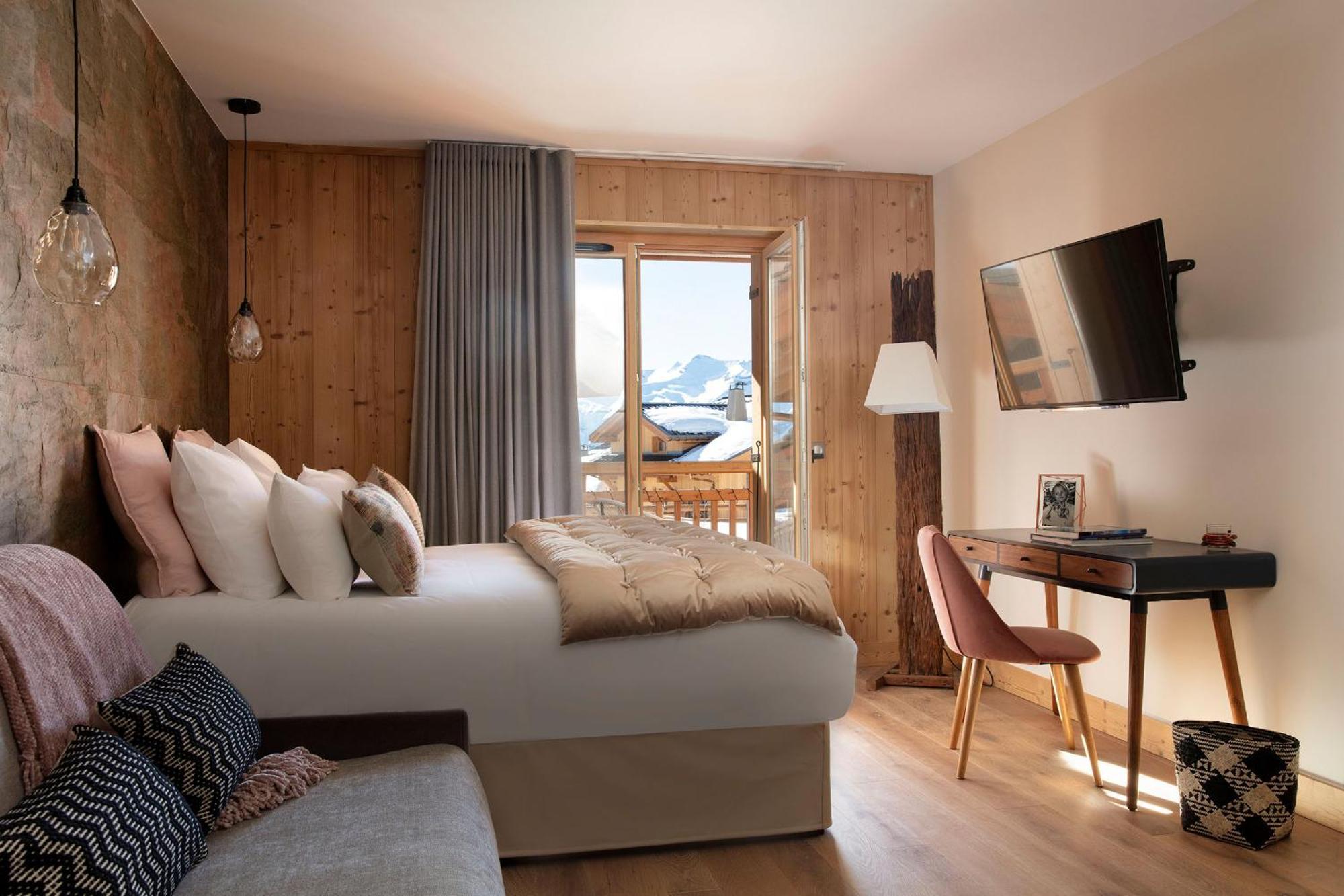 Hôtel Grandes Rousses Alpe d'Huez Exterior foto A room at the hotel