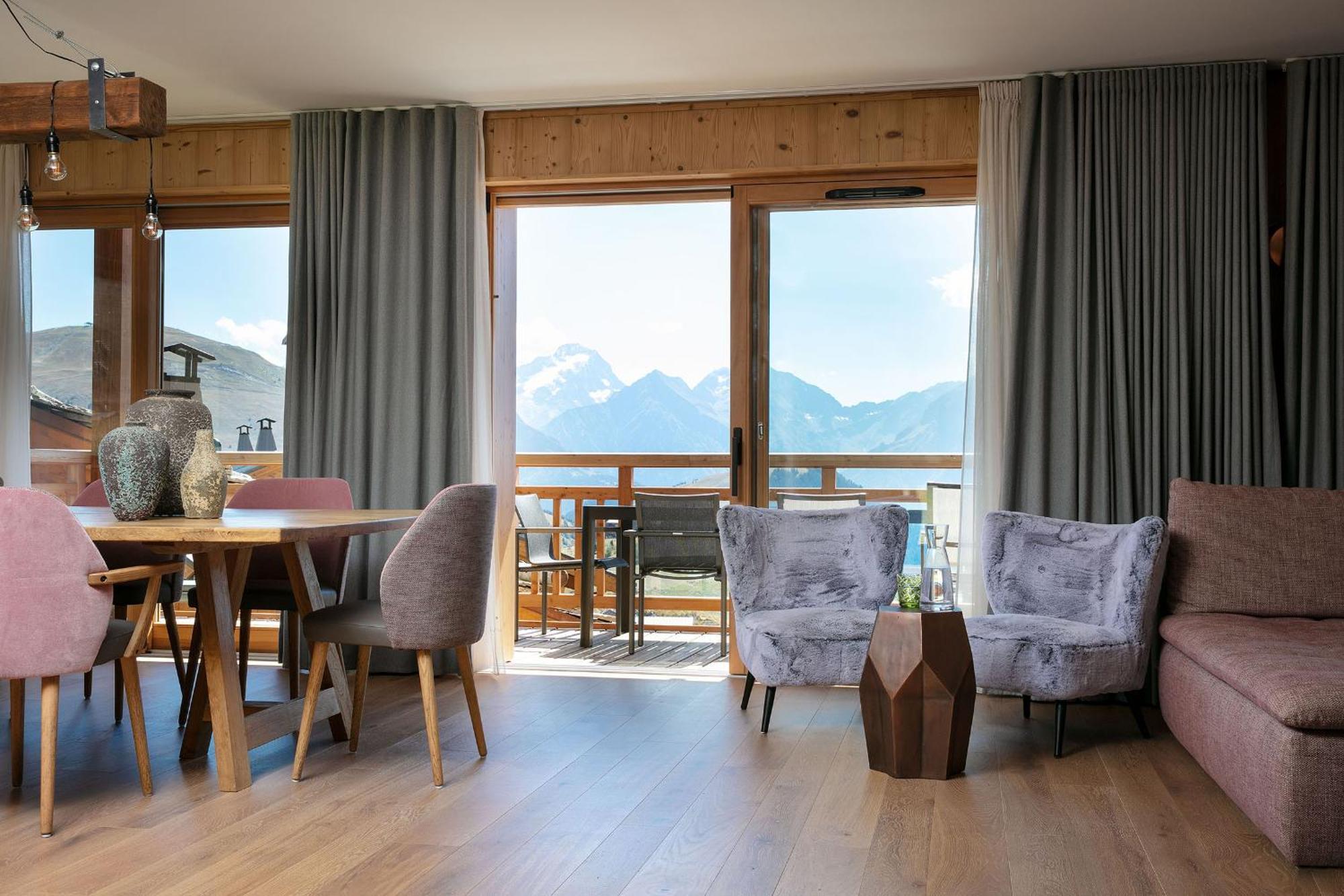 Hôtel Grandes Rousses Alpe d'Huez Exterior foto A living room in a chalet